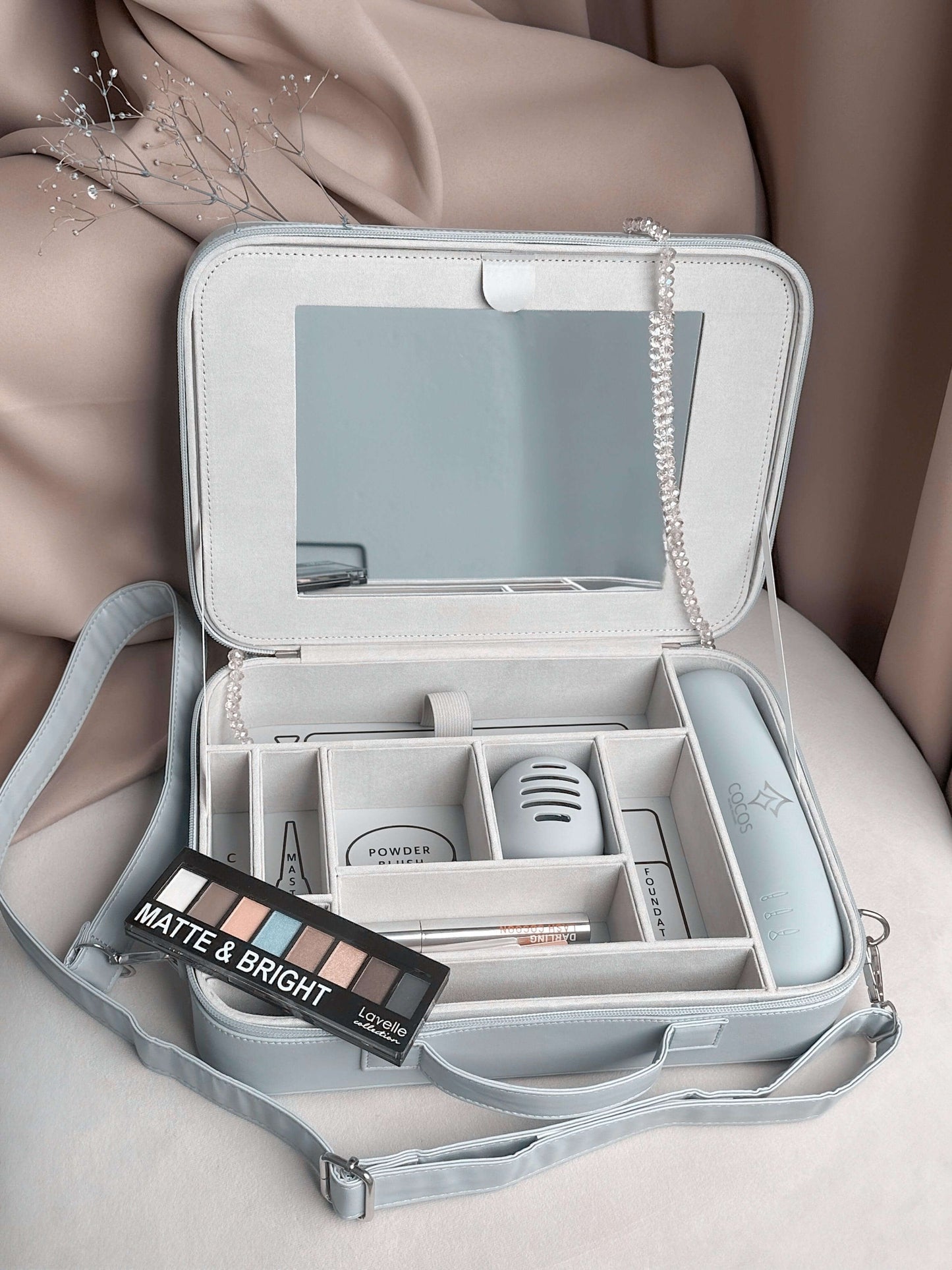 Stylish cosplay box with built-in mirror, labeled compartments, and makeup palette, ideal for organizing and traveling with cosplay essentials.